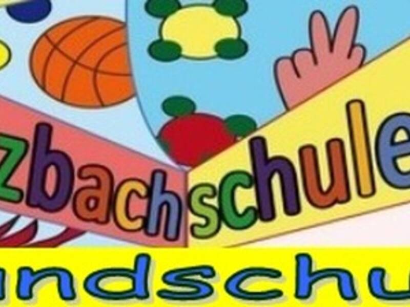 Schriftzug Walzbachschule Grundschule eingebettet in bunten Punkten, Farben und Formen